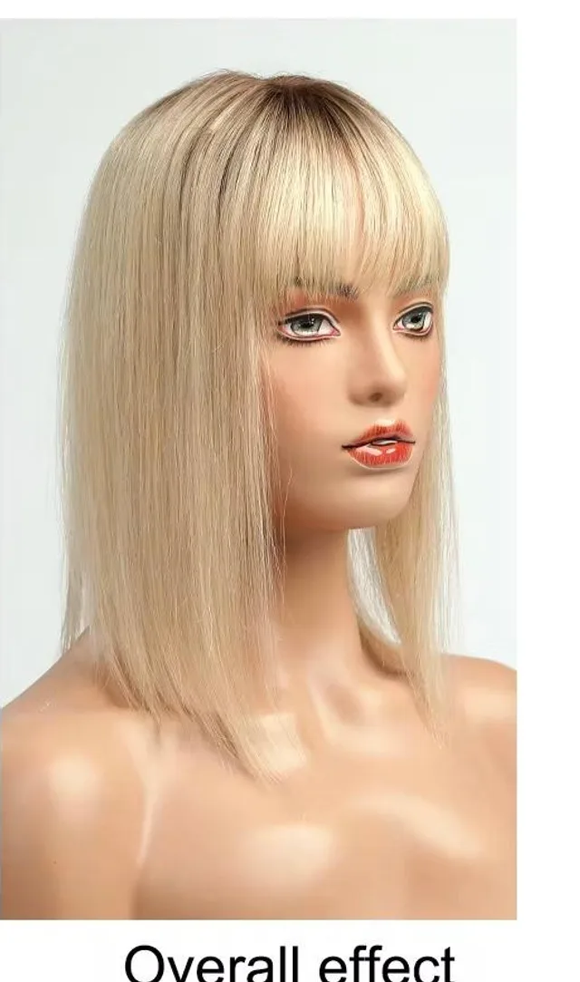 Human hair topper worn on a mannequin, blonde with a natural parting